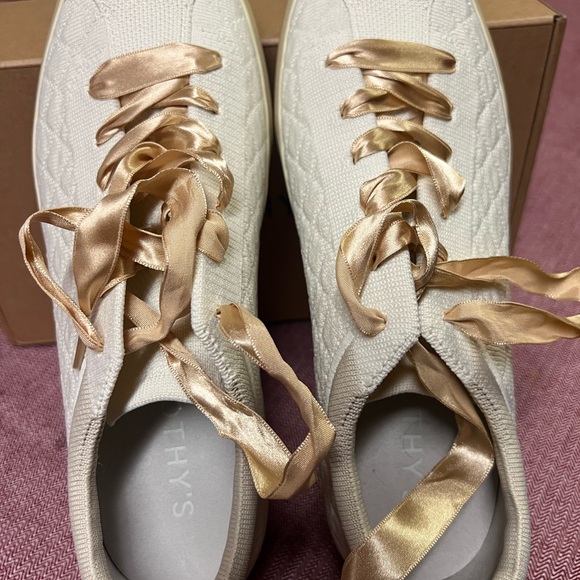 Rothy\'s Women\'s White Quilted Sneakers with Gold Accents